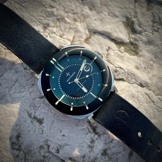 42mm Auto with Teal dial DLC bezel